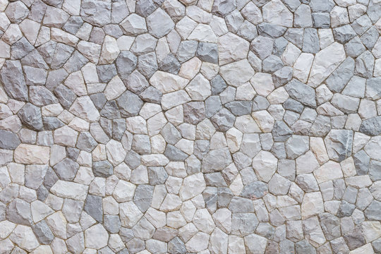 Grey pattern of decorative brown grey slate stone wall surface