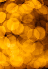 Blur background of gold color bokeh light