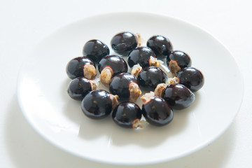 longan fruits seeds on white isolated background.
