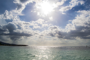 Sun shining over turquoise waters