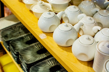 Kuala Lumpur, 1 September 2019 - colorful white tableware in the store. The concept of choosing dishes, sales, promotions. e store