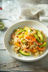 Fototapeta na wymiar Quinoa with shrimps and avocado