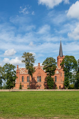 Fototapeta na wymiar The Evangelical Reformed Church of Lithuania, red brick church in Birzai, Lithuania