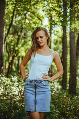 Fototapeta premium Girl in the wood