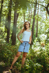 Fototapeta premium Girl in the wood