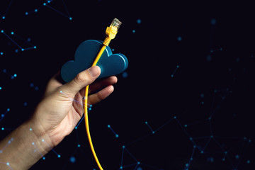 man hand with data digital cloud storage and lan server internet yello wire in technology ai...