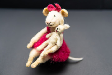 Close-up of felted wool toy. Hobbies, handmade, craft, leisure, learning, mouse, creativity, design concept, hare