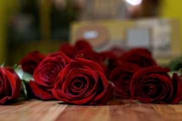 red roses lie on the table view close