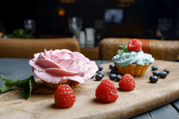 Cake, muffin, celebrate muffin with cream and decoration