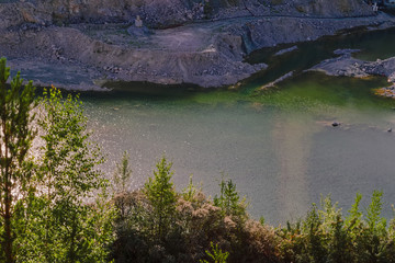 Top view of a large quarry dolomite. Top view of a large quarry dolomite with water.