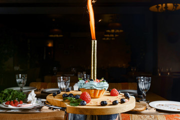 Cake, muffin, celebrate muffin with cream and decoration