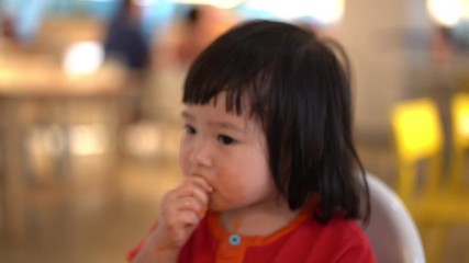 asian cute girl having breakfast 