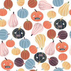 Seamless pattern with funny pumpkins. Holiday autumn background. Vector hand drawn illustration.