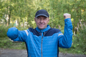 Portrait of a disabled man with one hand.
