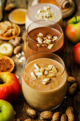 peanut butter smoothie with milk, chocolate, apples, banana and oats