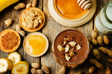 peanut butter smoothie with milk, chocolate, apples, banana and oats