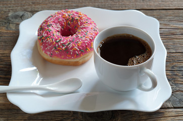 Cup of coffee and donut