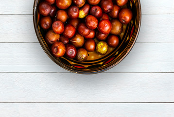 Jujube. Fresh jujube in morocco bowl on wood table