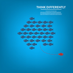 Think differently -One red unique different fish swimming opposite way of identical blue ones.