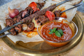 Arabic Barbecue food with fresh tomato sauce and garlic 