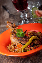 grilled chicken leg on rice with chillie