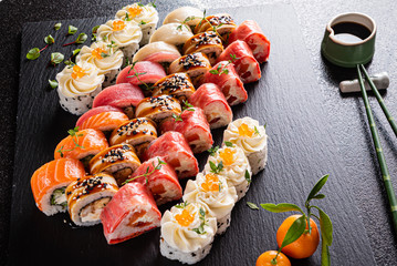 Fototapeta na wymiar sushi set on the black background