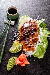 sashimi on the black background