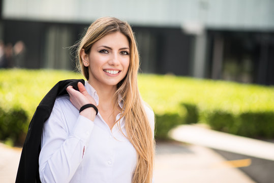 Smiling young business woman portrait