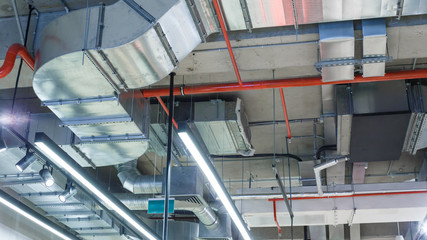 Industrial utilities under the ceiling. Ventilation, air conditioning, lighting and fire fighting.