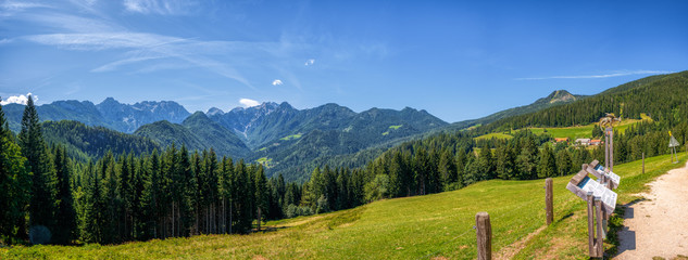 Sunny summer landscape with Solcava panoramic road, Logarska Dolina,Slovenia.A popular tourist and travel destination © asafaric