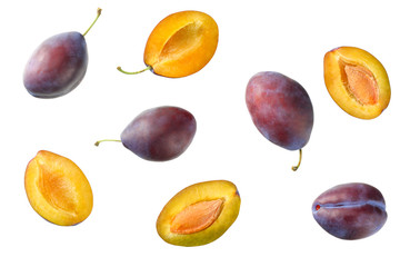 fresh plum fruit with cut plum slices isolated on white background. top view