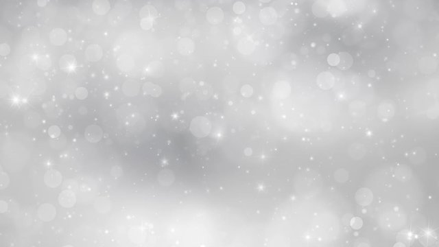 Silver bokeh background with sparkle. Christmas and New Year copy space animation.