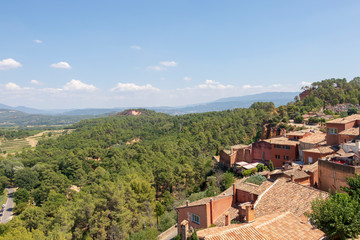 The small village of Roussillon. Landscape with houses in historic ocher town Roussillon, Provence, France