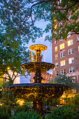 View of Jackson Square Park fountain in Greenwich Village at night