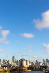 Beautiful skyline view of Buenos Aires, Argentina city center from Puerto Madero in sunny summer day with blue sky. Skyscraper office architecture, old buildings and city apartments.