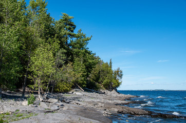 Fototapeta na wymiar rocky shoreline on Lake Champlain