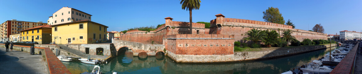 Obraz premium Panoramic view of Fortezza Nuova castle with its moat Fosso Reale in Livorno, Italy