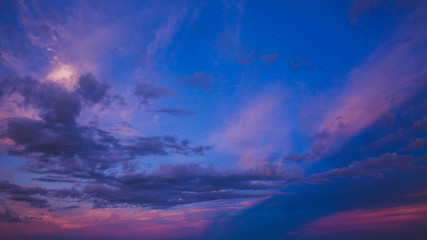 Naklejka na ściany i meble Colorful sky after the sunset on the beach