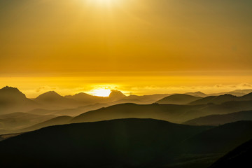 Yellow Sunlight in Afternoon with Ocean, mountains