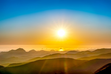 Afternoon Sun over Mountains, Ocean