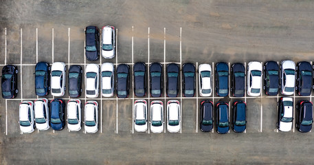Aerial view cars for sale stock lot row, Car Dealer Inventory, parking lot. black and white new...