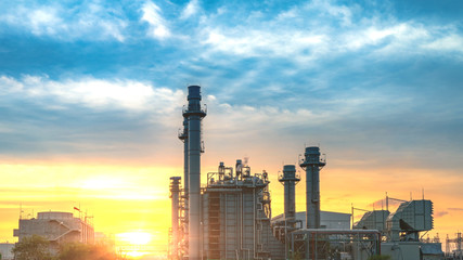 Fototapeta na wymiar Petrochemical industrial plant power station at sunset and Twilight sky view,Amata City Industrial Thailand