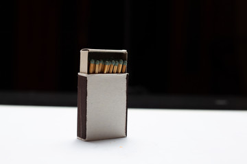 Close-up of opened matchbox with mockup.