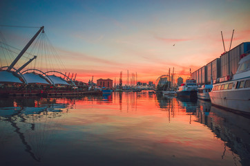 Panoramic view of old port of Genoa at sunset, Liguria, Italy