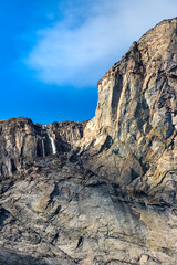 Detail of a waterfall on a cliff in Buchan Gulf, Baffin Island, Canada.