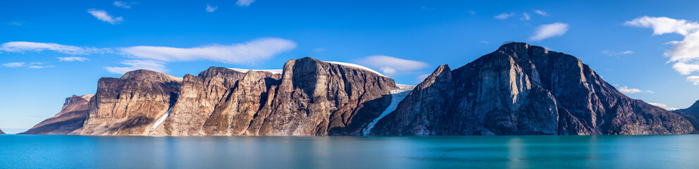 Fototapeta na wymiar Panoramic view of the cliffs and mountains in Buchan Gulf, Baffin Island, Canada.