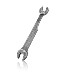 wrench falls in the air on an isolated white background