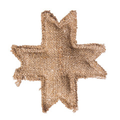 Christmas star from burlap on isolated white background