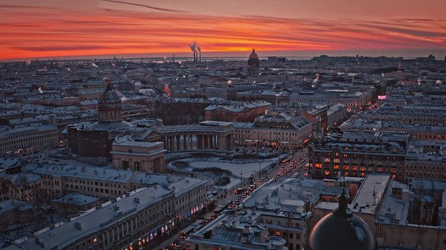 Evening winter sunset view of Nevsky Prospect and the historical center of St. Petersburg, including Kazan Cathedral, Zinger House, St. Isaac's Cathedral