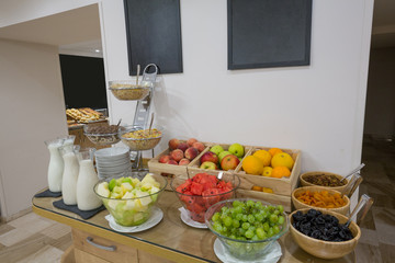Breakfast buffet table muesli and fruits
